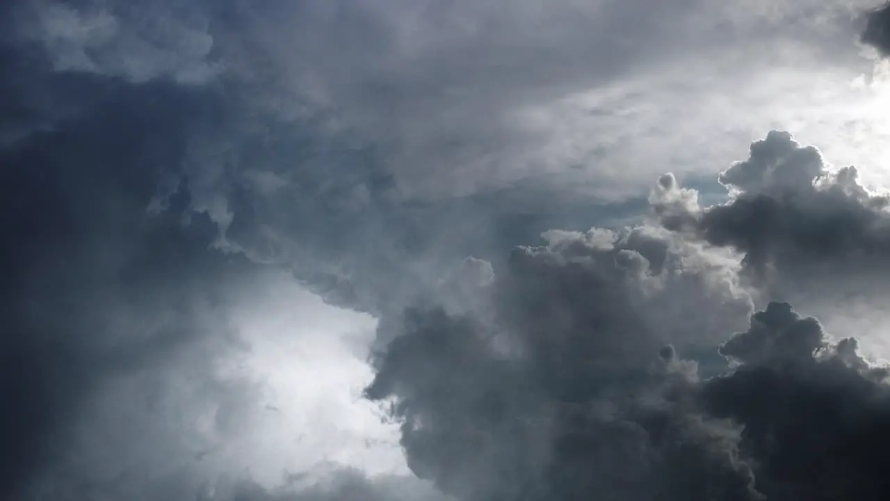 POV thunderstorm with cumulonimbus dark clouds moving in the sky