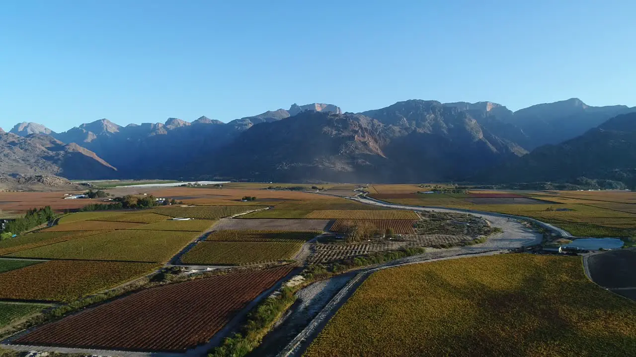 Stunning aerial views over the hex river valley near the town of De Doorns in the Western Cape of South Africa during the Autumn season with amazing colors in the vineyards