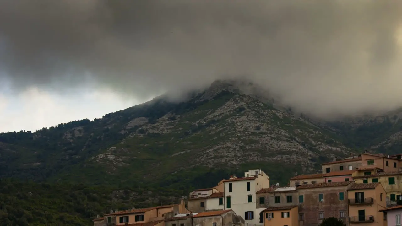 Dramatic timelapse of clouds circling a mountaintop