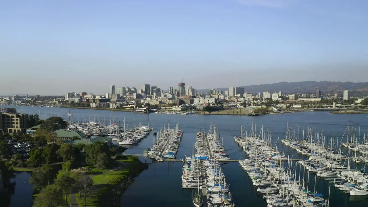 We pan right over the massive city with the sailboats and estuary in view