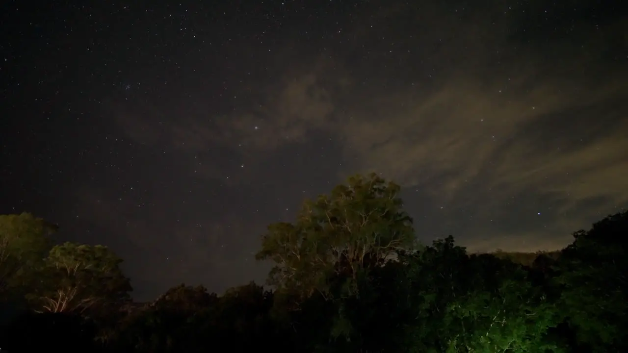 Starry Night Sky Timelapse Over Australian Country Landscape With Clouds And Lightning Moving 4K