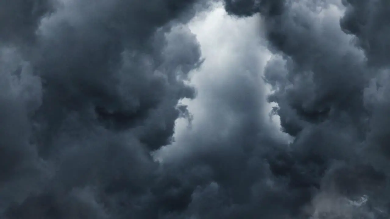 Thick dark clouds of cumulonimbus moved and lightning bolted across the sky