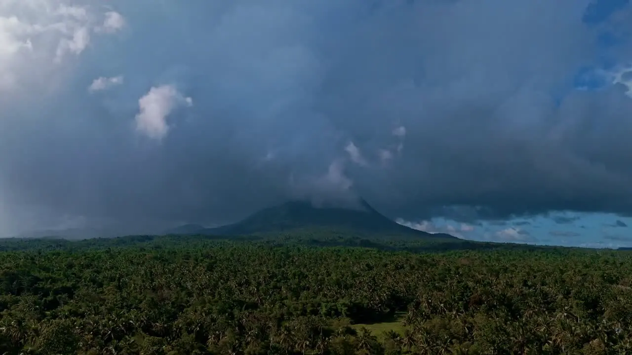 Drone Reveal of Paco Volcano Amidst Stormy Skies in Mainit Philippines