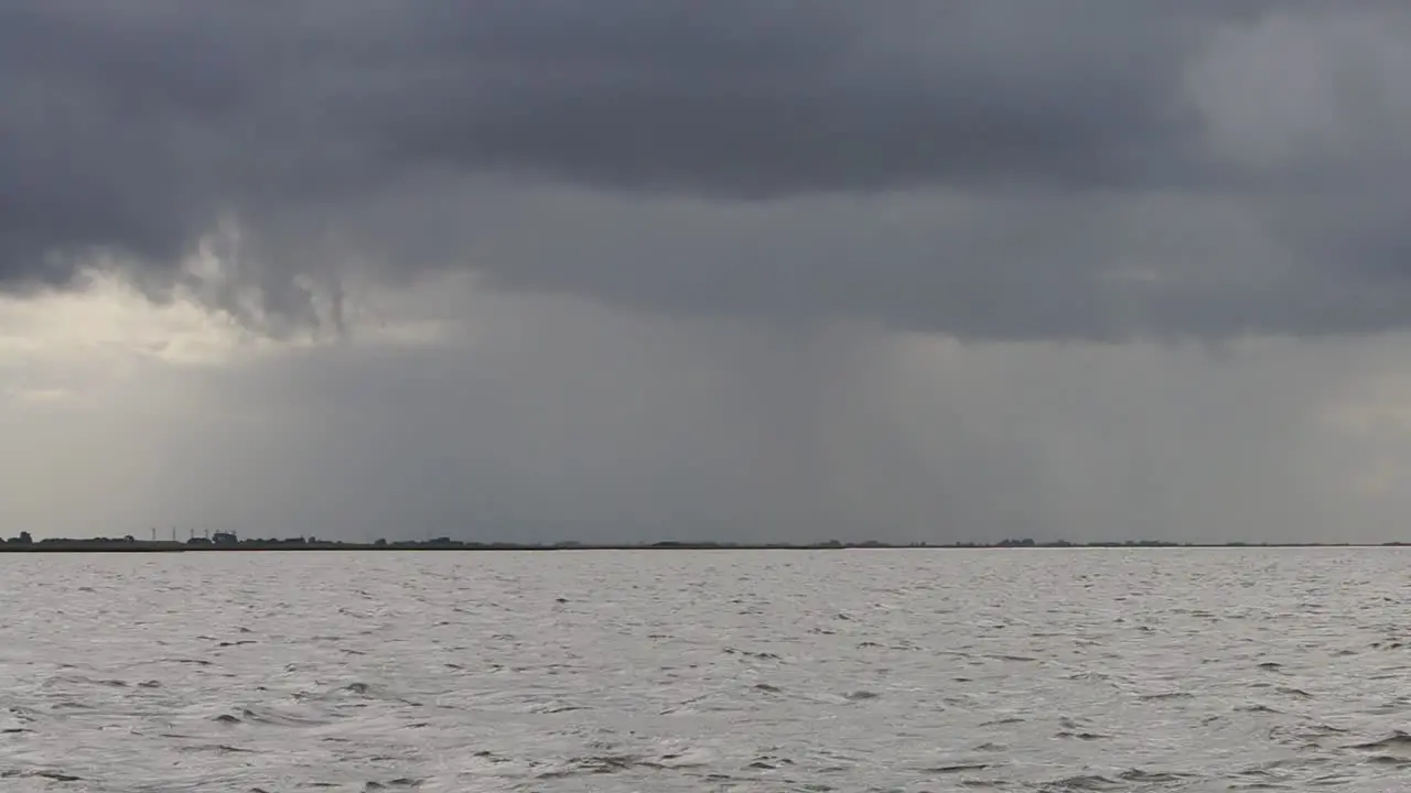 Stormy sky over sea Wadden Sea Netherlands