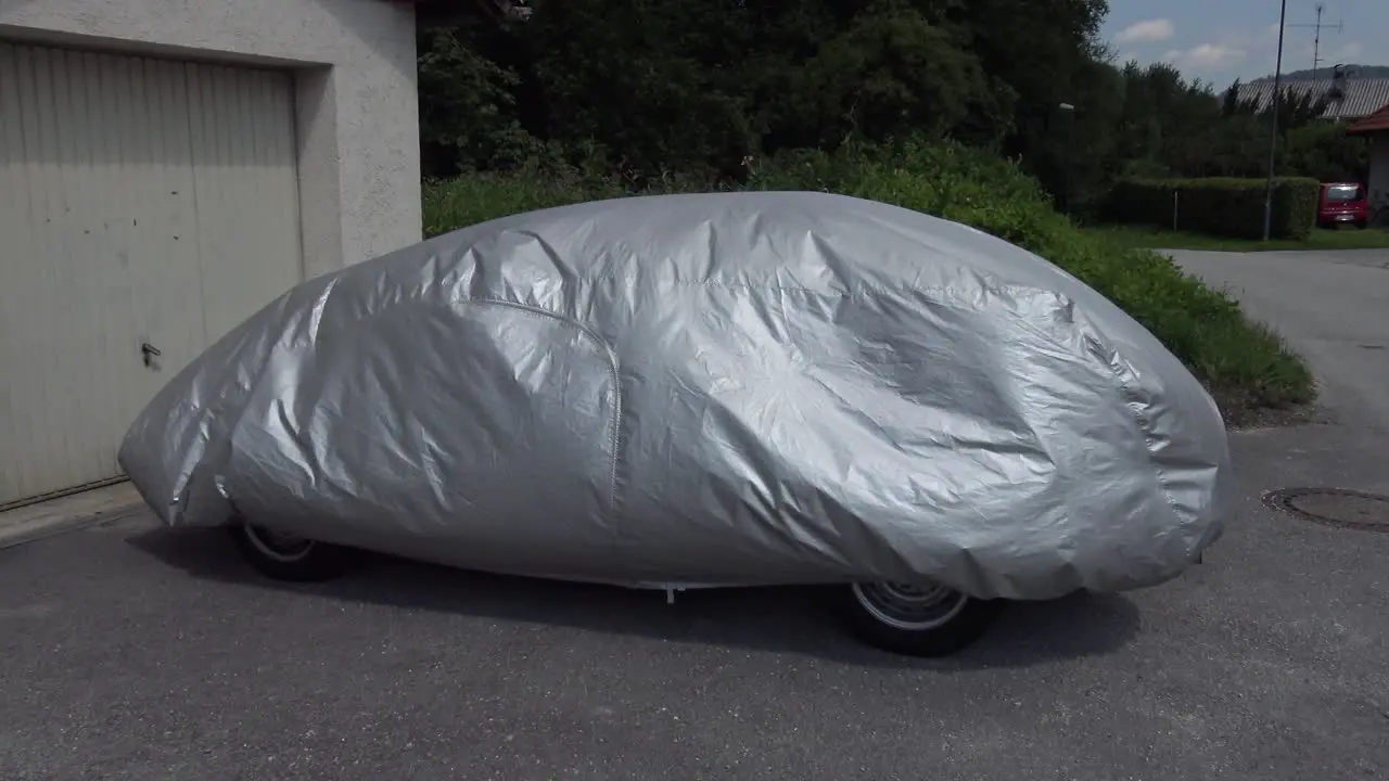 Car cover blowing in strong wind