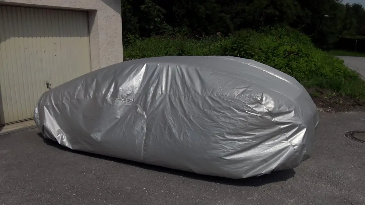 Car cover blowing in the wind