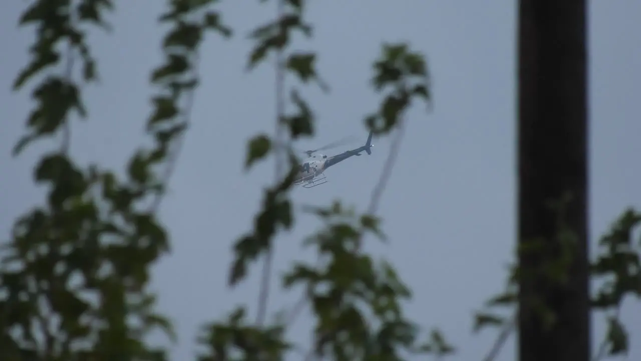 news helicopter flying through stormy skies