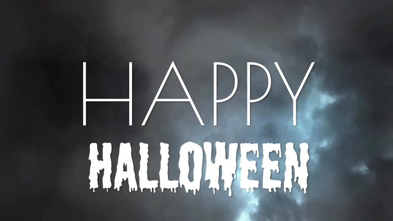 Animation of happy halloween text over stormy sky