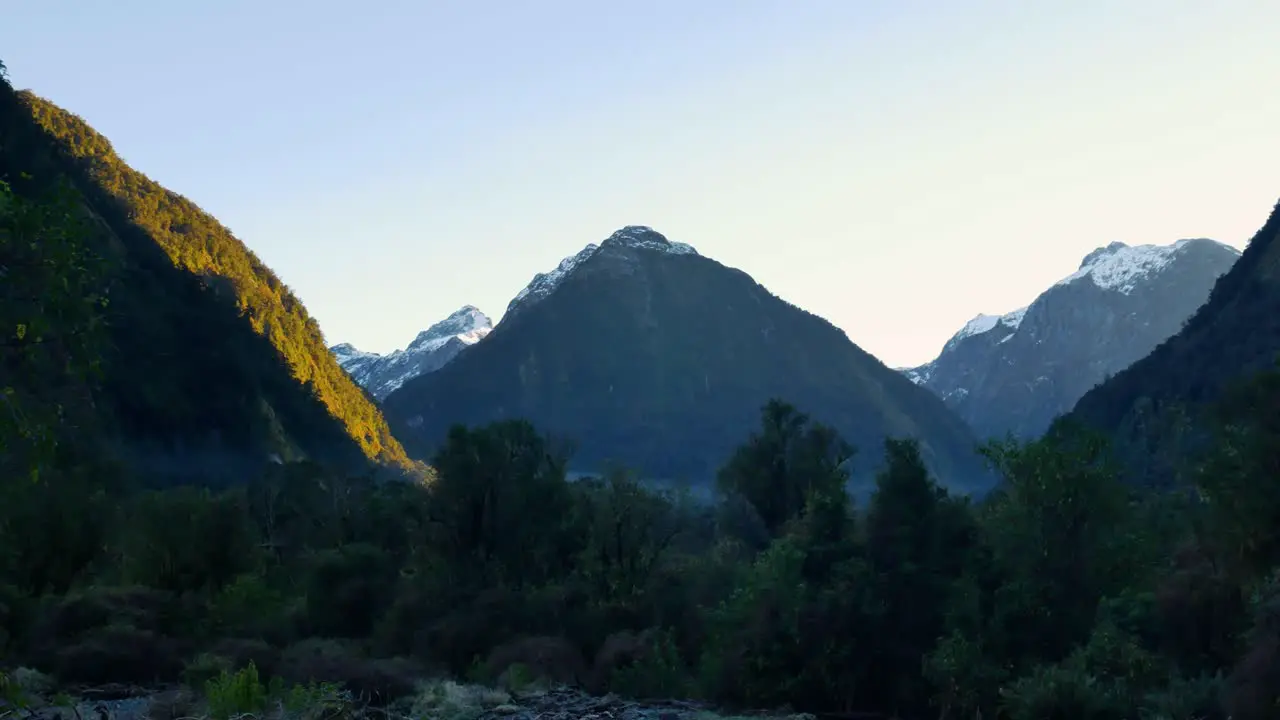 slow pan of ominous mountains in New Zealand's Fiordland