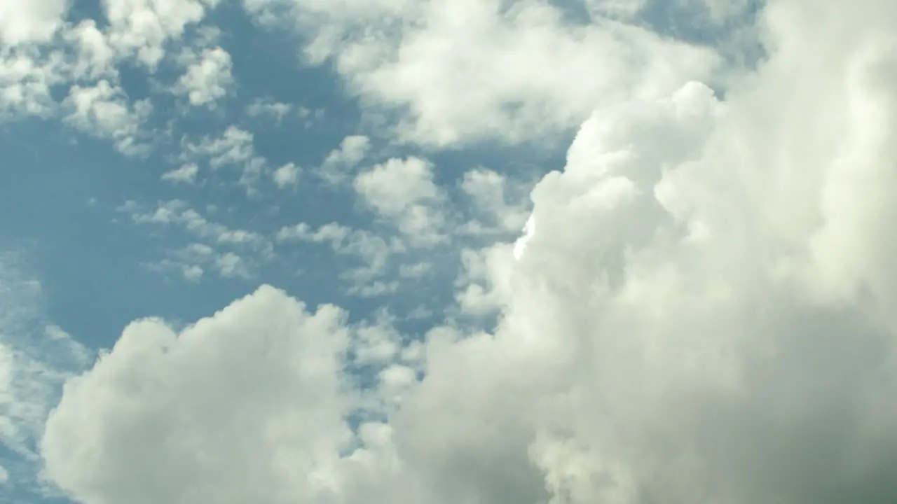 Storm clouds moving in on a deep blue sky