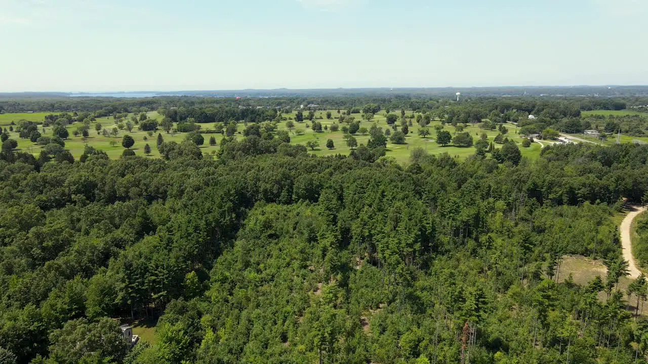 An aerial push to show off a Golf Course from the air