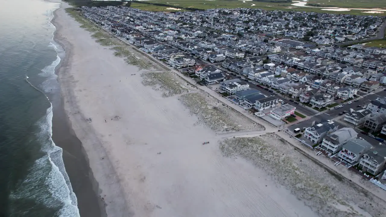 Drone flyover of Ocean City showing the beach and neighborhood