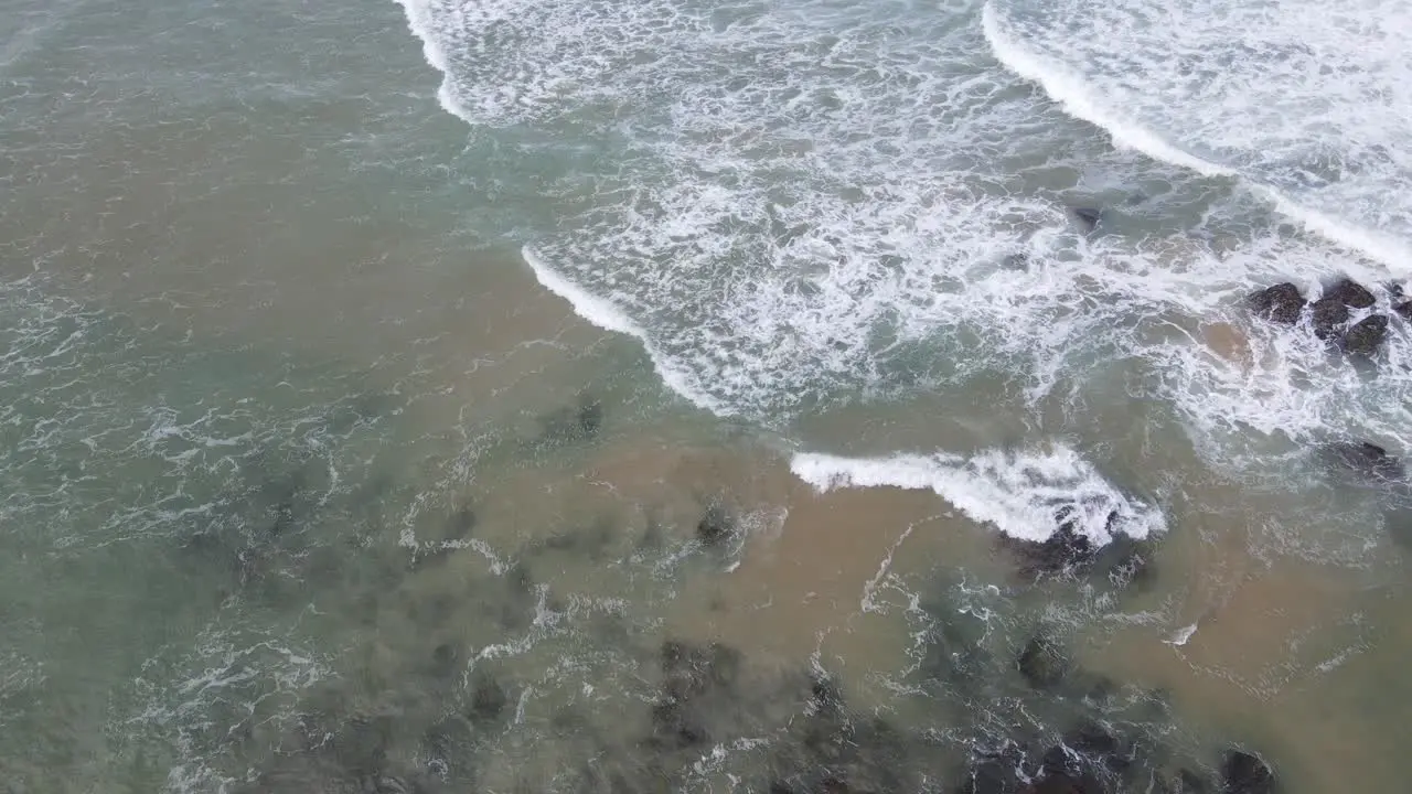 Ocean Waves Splashing On Outcrops At Sawtell Beach In New South Wales Australia