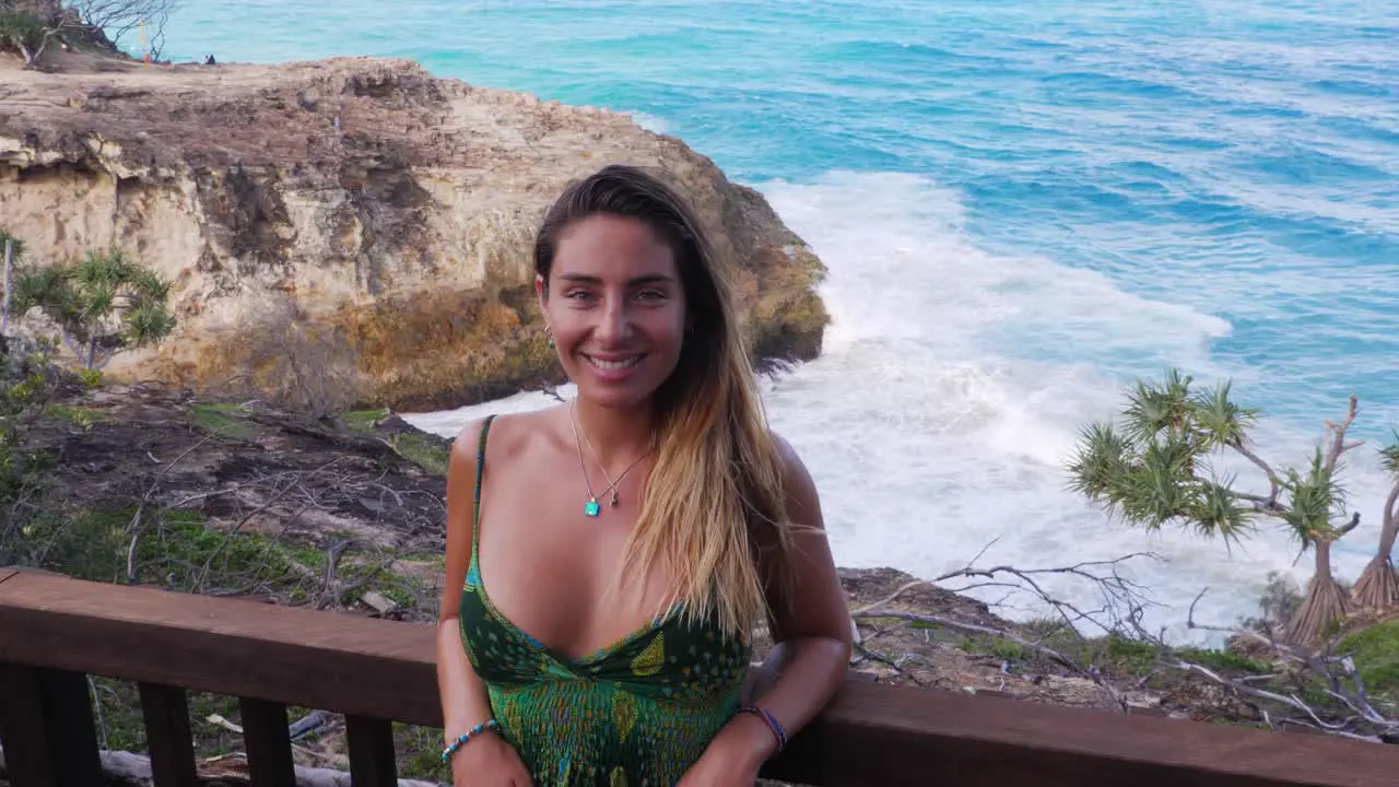 Caucasian Girl Posing And Smiling At Camera Coastal Cliff With Crashing Waves At North Gorge Walk North Stradbroke Island Australia