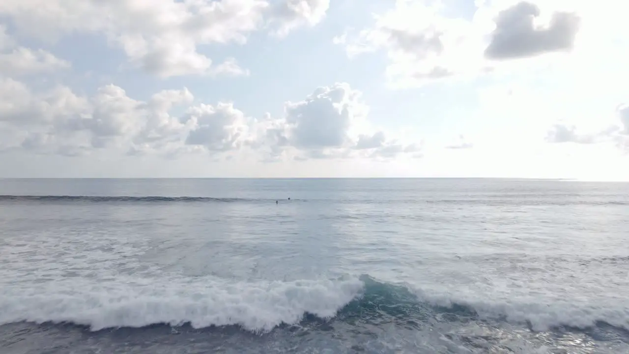 Aerial View of waves crashing on a sunny day Dominical Beach Costa Rica Tracking Shot