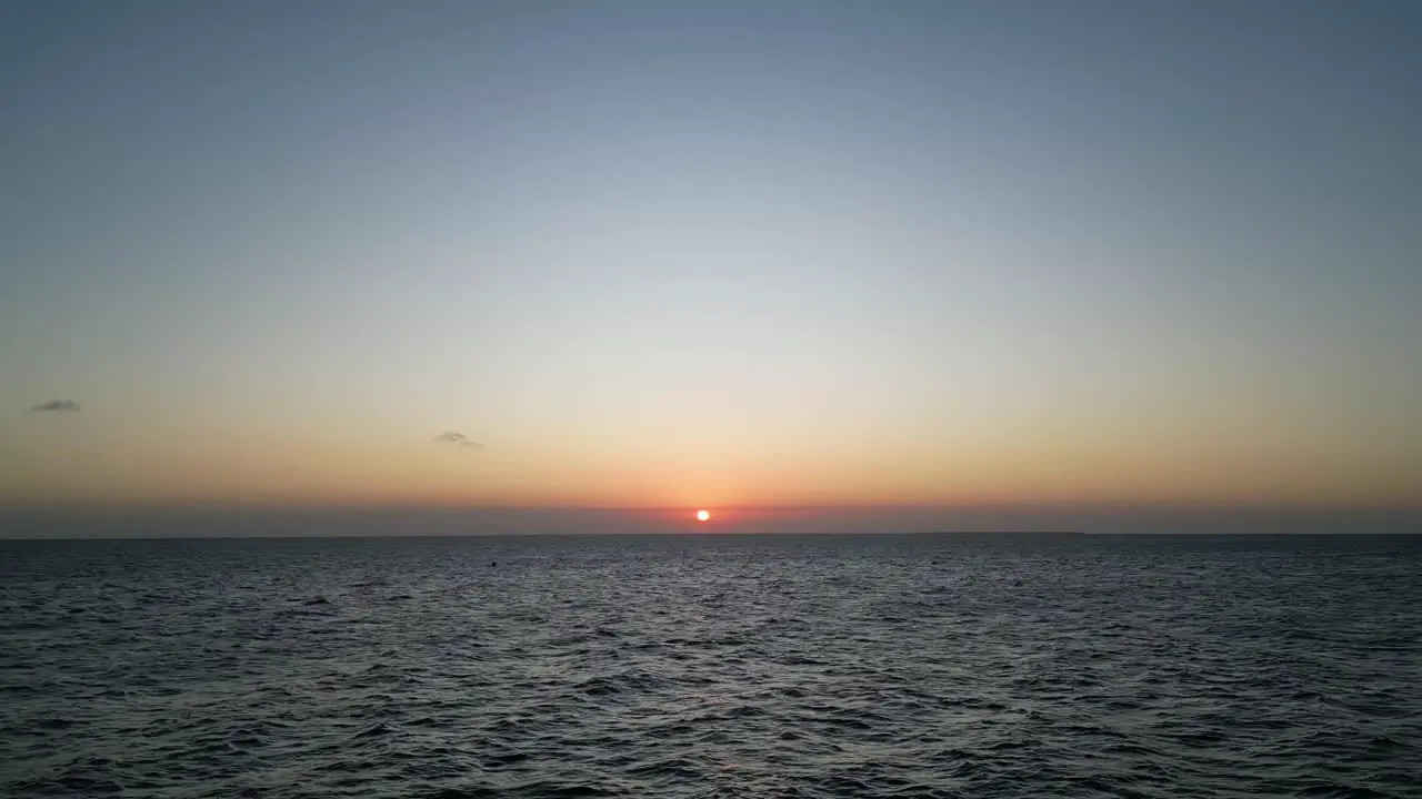 Sunset Indian Ocean horizon at Kusini beach East Zanzibar Island Tanzania Africa Locked shot