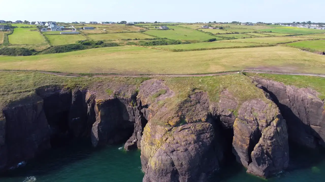 Big cliffs in Ireland seeing from the middle of the sea