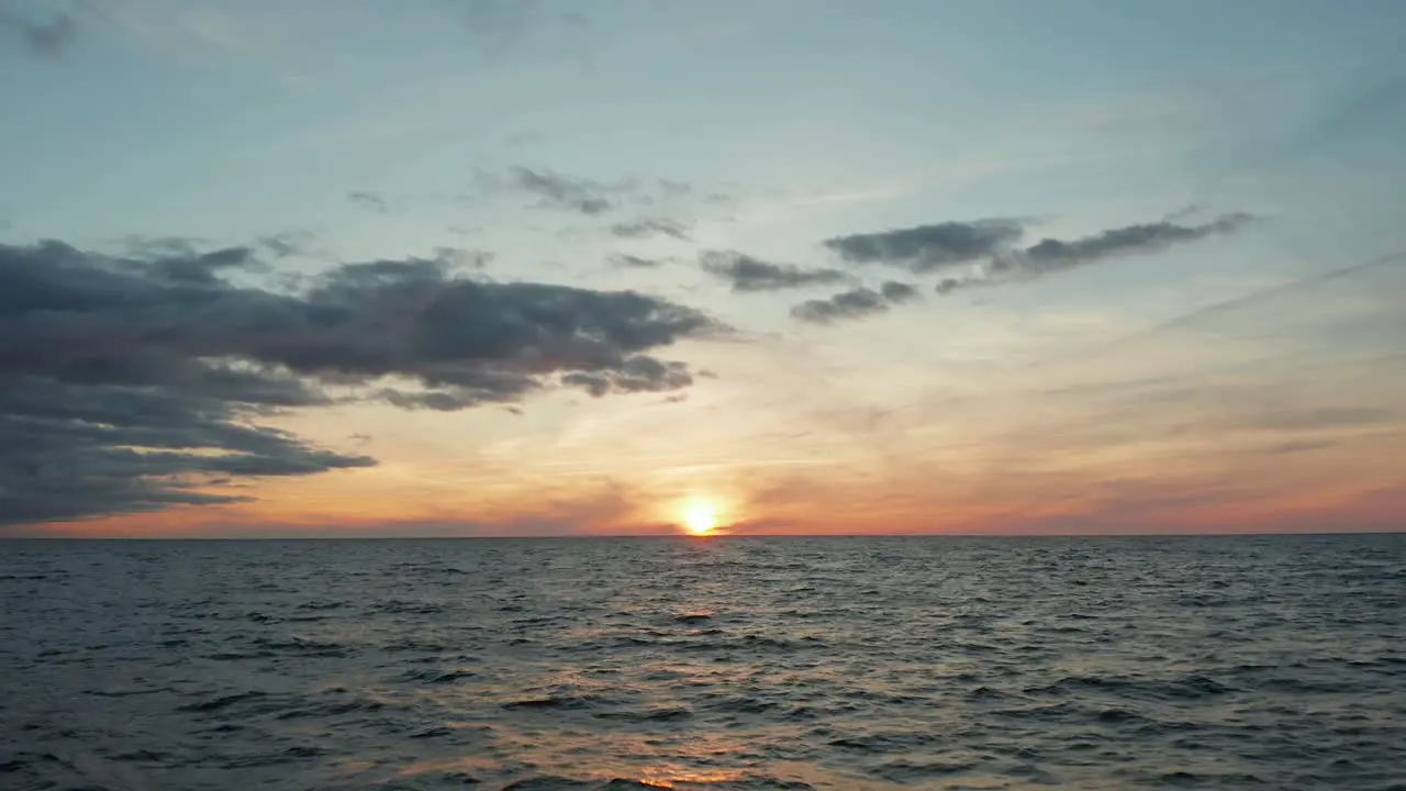 Golden sunset at Baltic sea with dramatic clouds