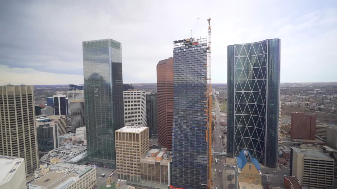 Wide panning shot of city Calgary with buildings