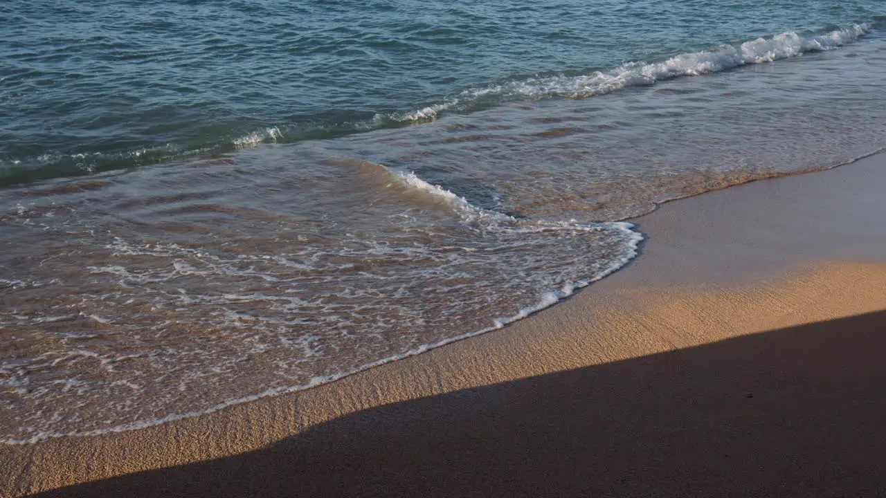 Serene Waikiki Beach with Blue Water and Ocean Waves on Sunny Day Hawaii Slow Motion