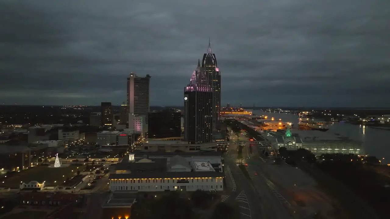 Aerial pan view of Mobile Alabama at night