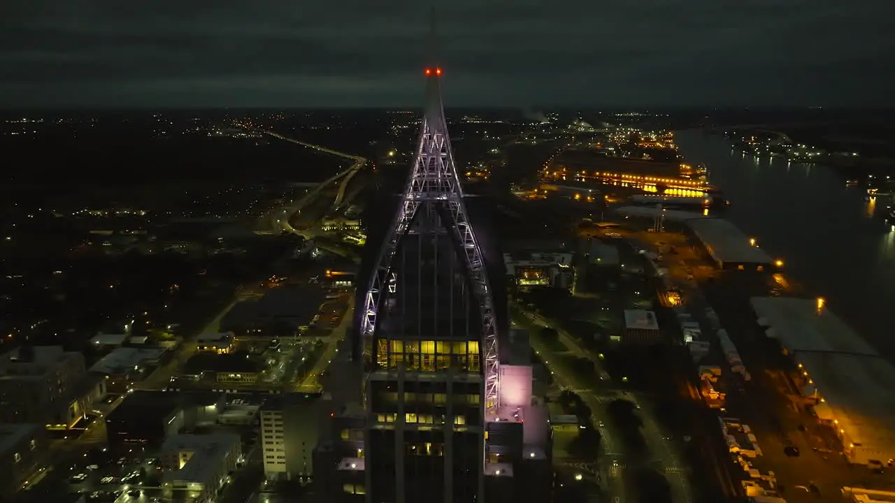 Aerial reveal of Mobile Alabama at night