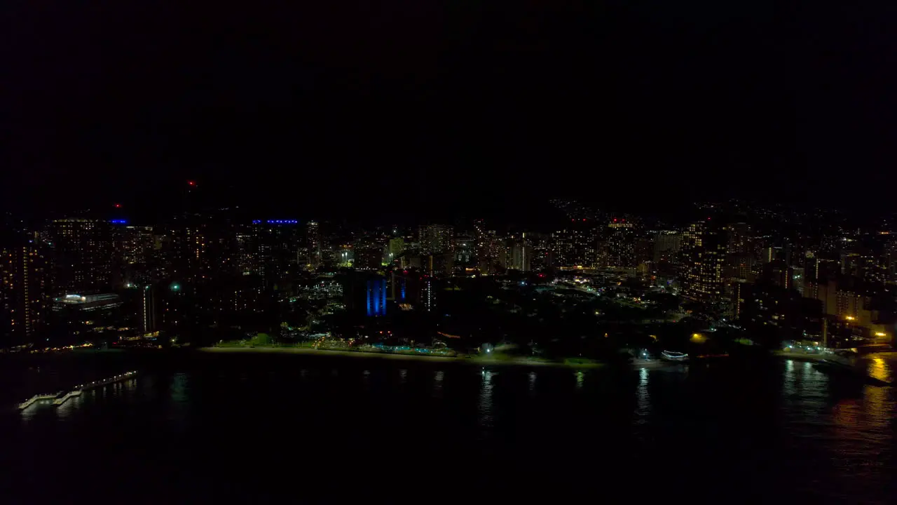 Aerial view of Honolulu at night 4k drone