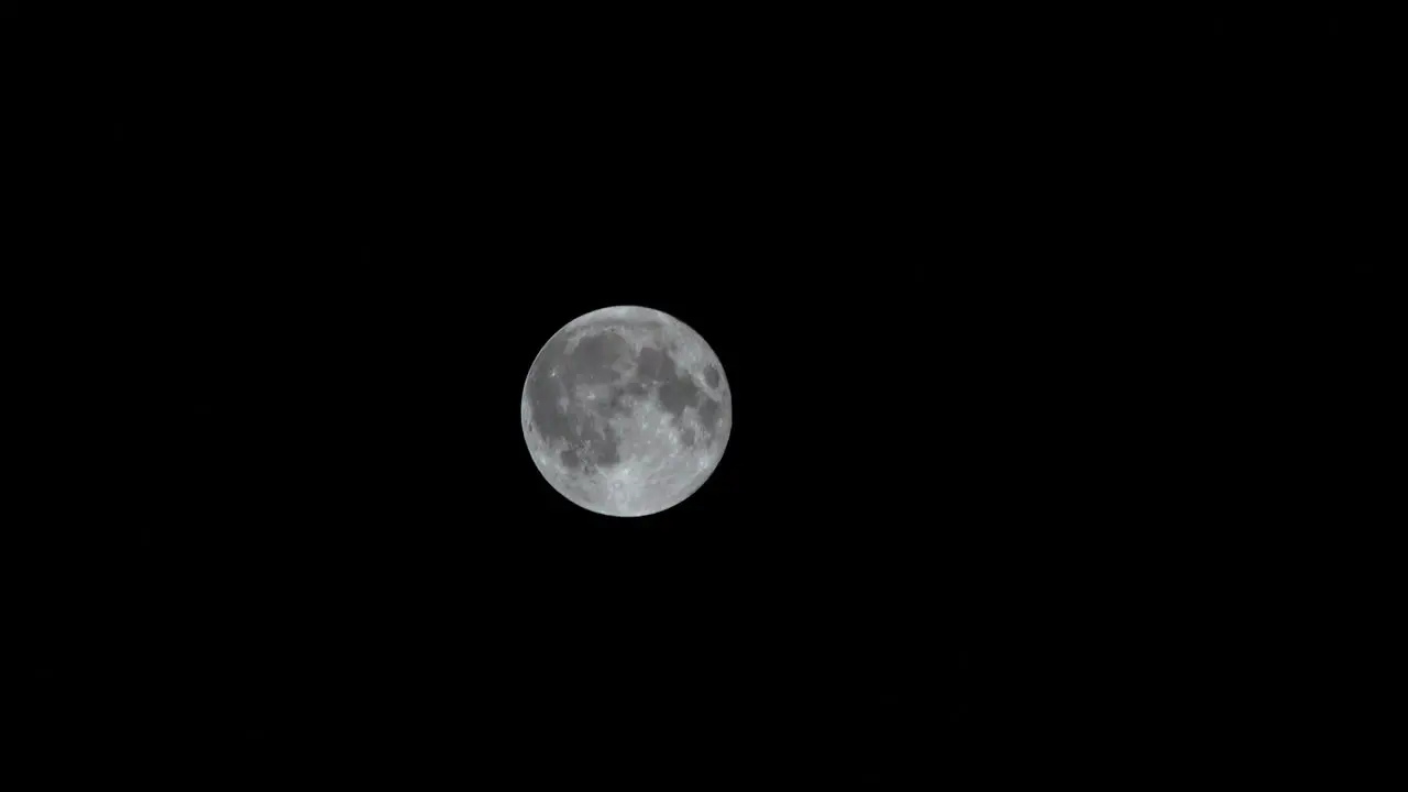 Full moon in a pitch black sky