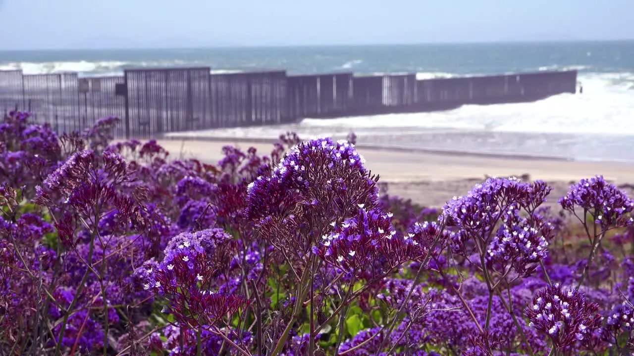 Waves roll into the beach at the US Mexico border fence in the Pacific Ocean between San Diego and Tijuana 5