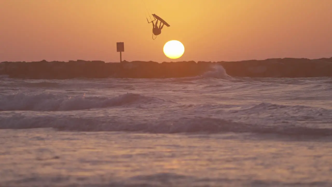 Beautiful sunset waves crashing on beach in summer warm golden hour slow motion peaceful scene to relax