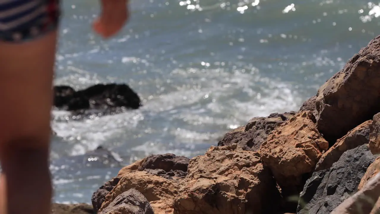 Malibu waves with girl walking by