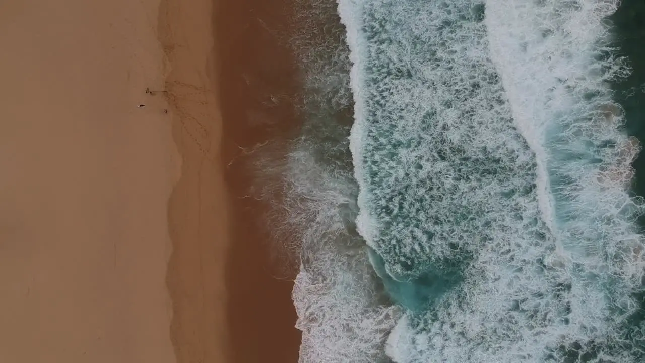 Blue Waves Breaking On a Beach