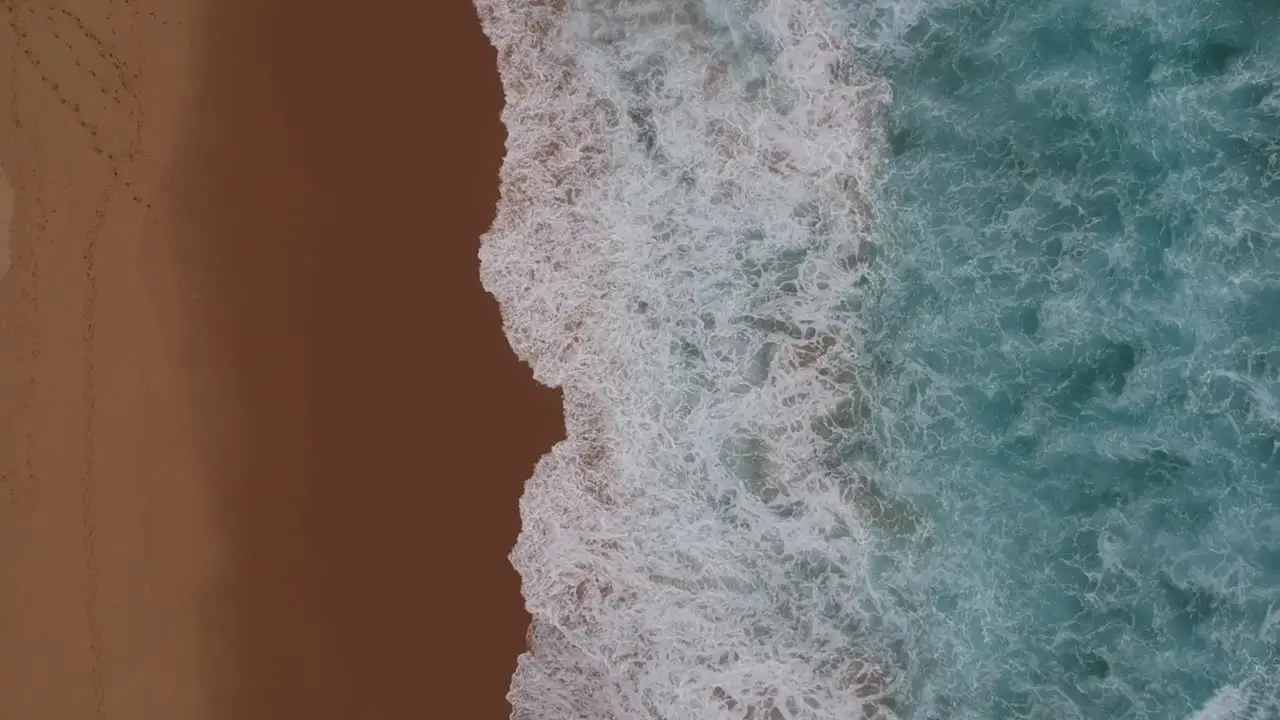 Top-Down View Of Waves And Coastline