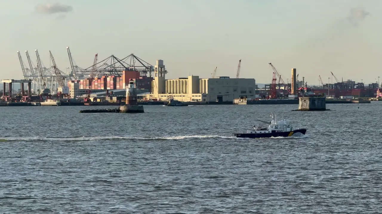 boats passing by the seaport blue sky with clouds recorded in NYC