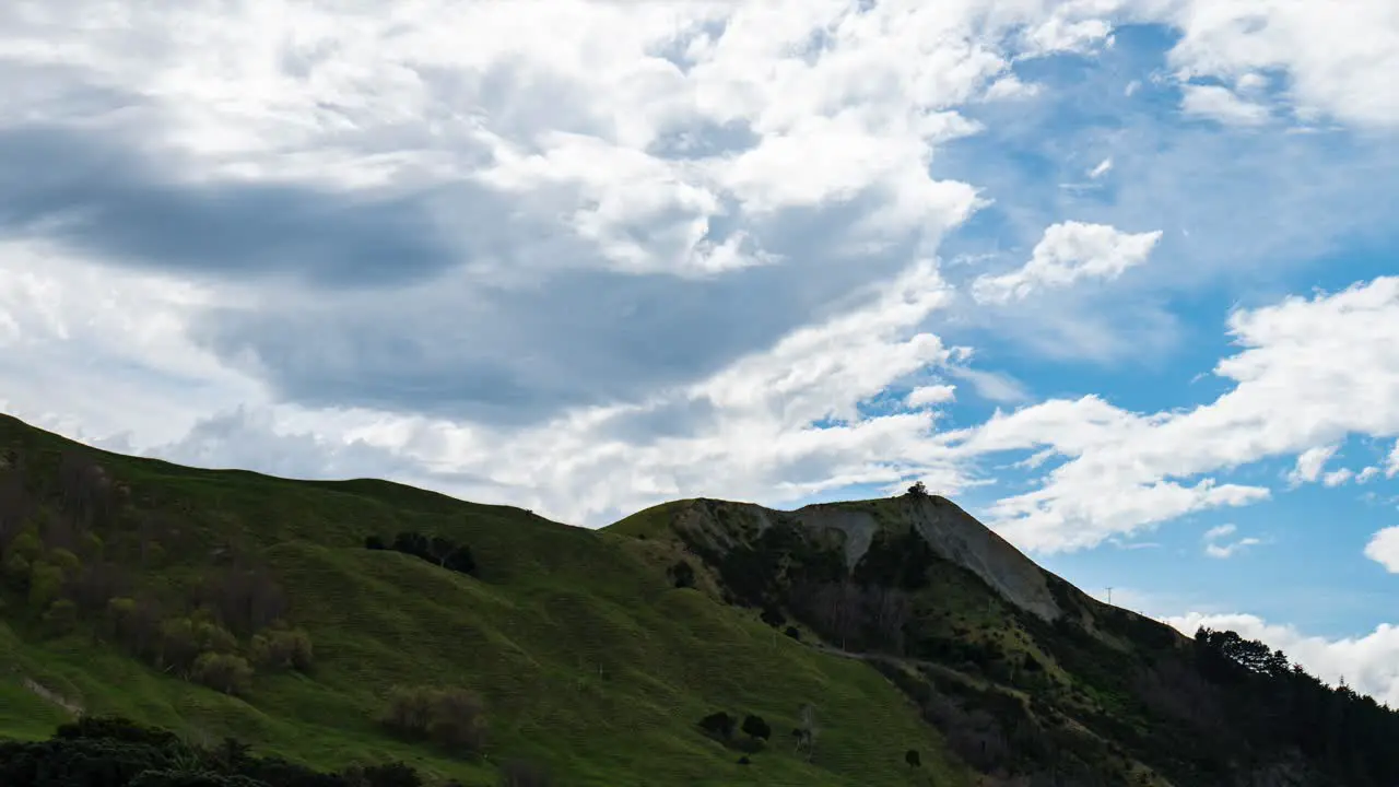 Mesmerizing timelapse of a hillside near the ocean captured from a unique perspective looking up showcasing the ever-changing beauty of coastal landscapes