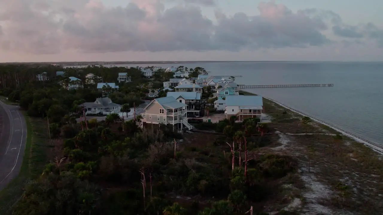 Beach front homes raised on stilts to protect from coastal surges