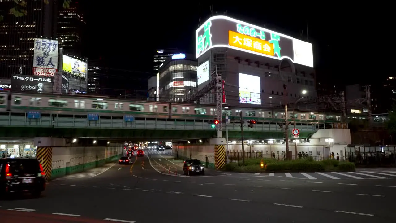 Night time scene capture of Shinjuku train bridge in Tokyo Japan