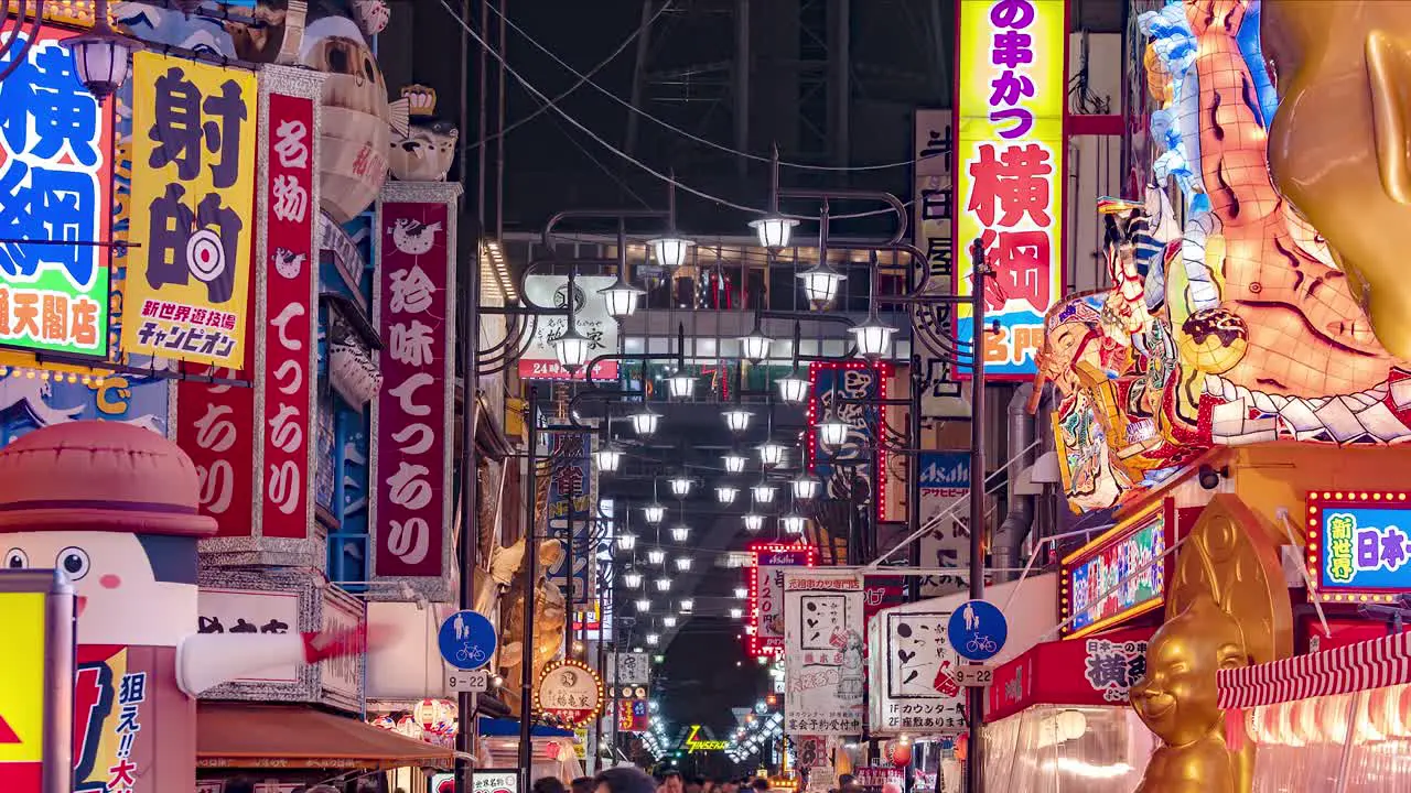 Time lapse of Osaka by Night Busy Crowds and city lights at the vibrant Ebisu Higashi District Osaka Japan TILT