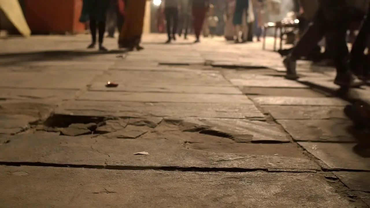 People Walking on Street in India at Night