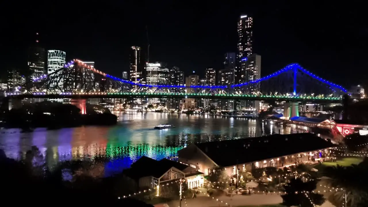 Brisbane city at night with the bridge and reflections and city skyline