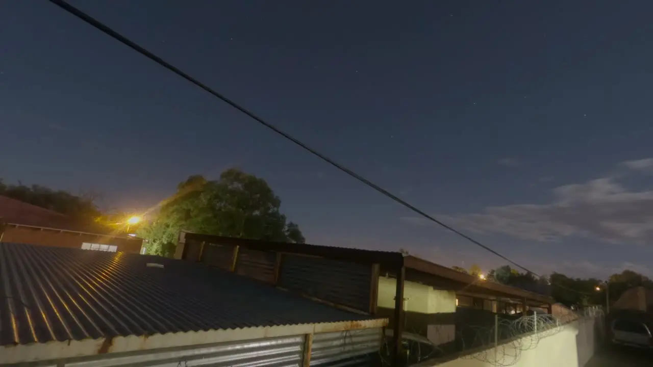 Night time lapse of a cloudy starry night