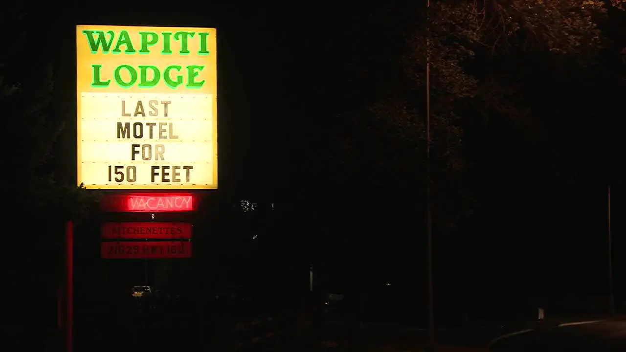 A road side motel advertises last motel for 150 feet