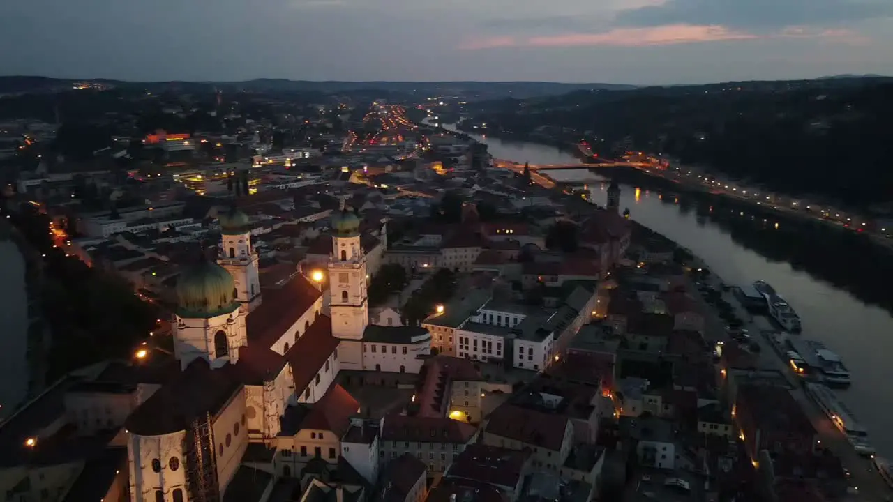 Passau German city at night with orbiting around city cathedral at sunset