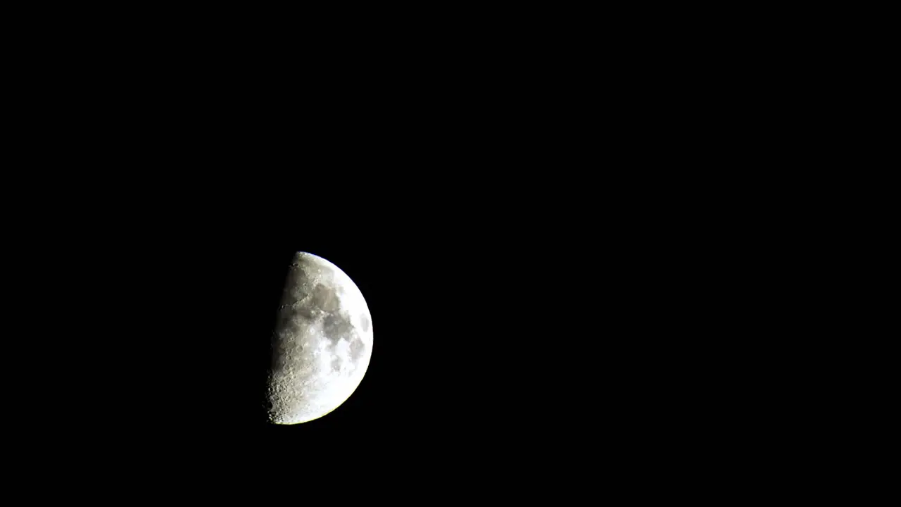 Time-Lapse Half Moon Clear Sky Moon Passing In The Night