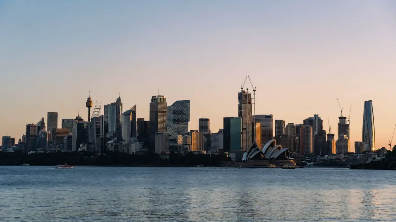 Day to Night Timelapse of Sydney Harbour and Opera House on a Clear Summer Day