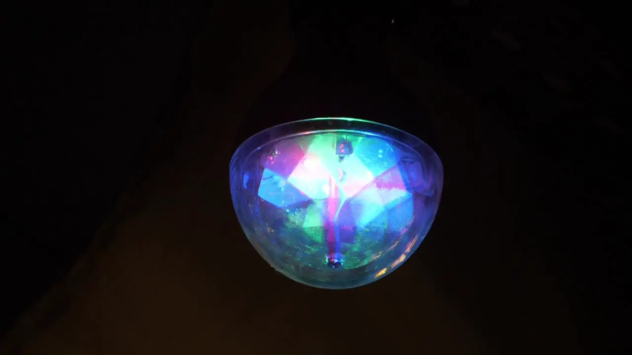 Light effect ball spinning in dark background Slow motion