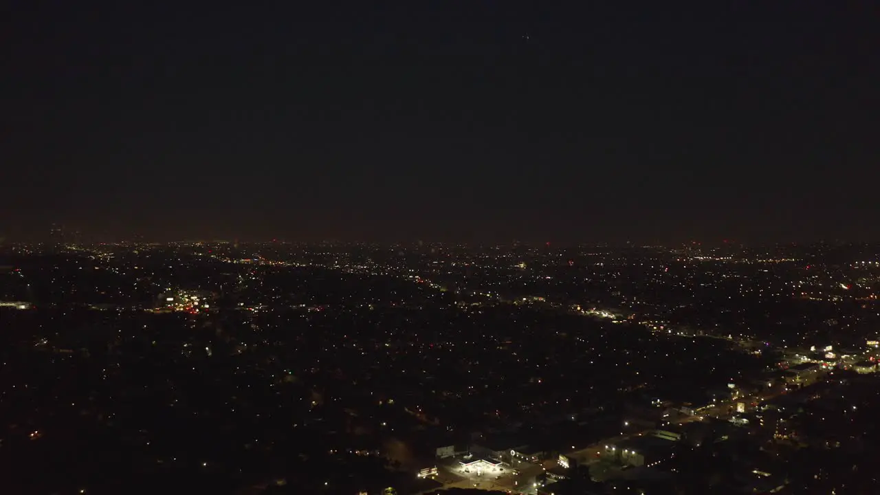 Amazing night aerial of fireworks explosions in big city