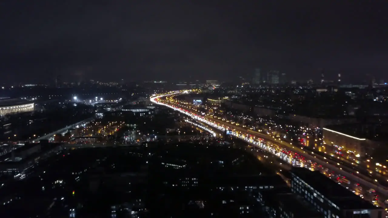 A beautiful aerial view of a night city sparkling with streetlights