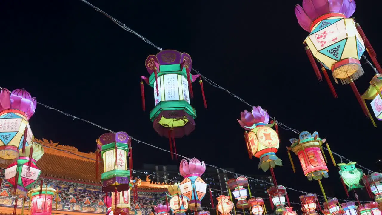 Colorful lanterns which symbolize prosperity and good fortune hanging from ceiling wires during the Mid-Autumn Festival also called Mooncake Festival