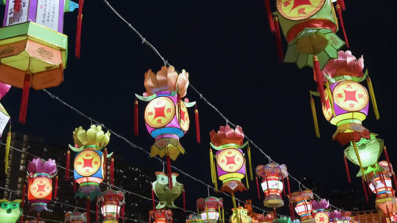 Chinese colorful lanterns which symbolize prosperity and good fortune hang from a wire during the Mid-Autumn Festival also called Mooncake Festival